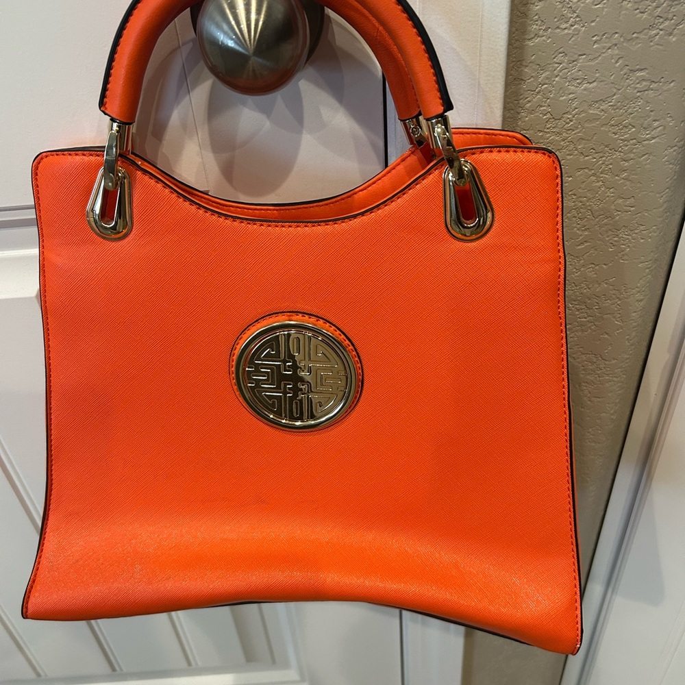 Orange Handbag with Gold Accents
